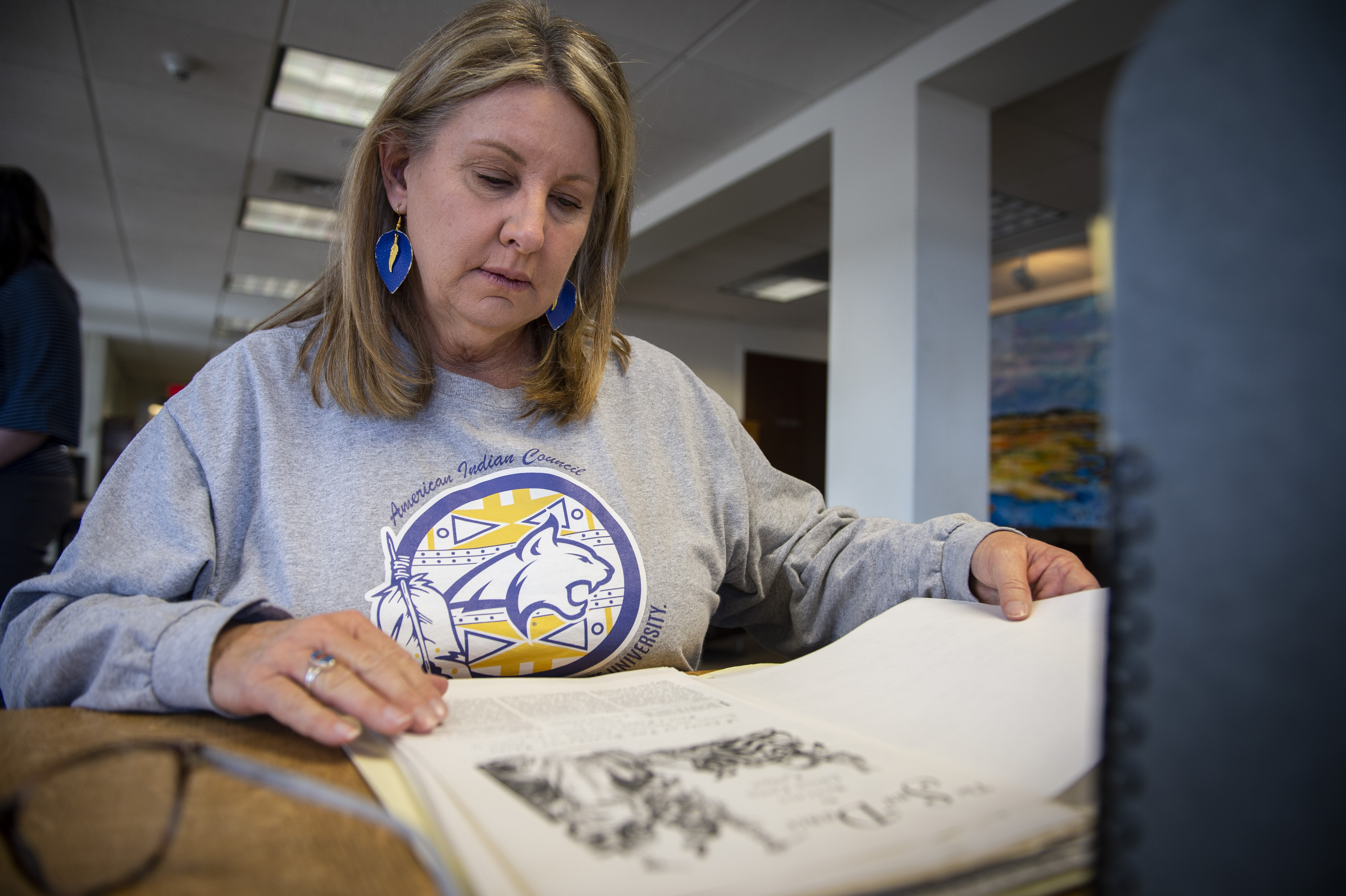 A student works with an archival collection