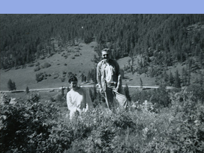 Image of two people in a garden